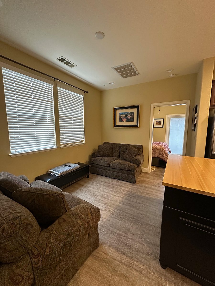 living room area looking into bedroom