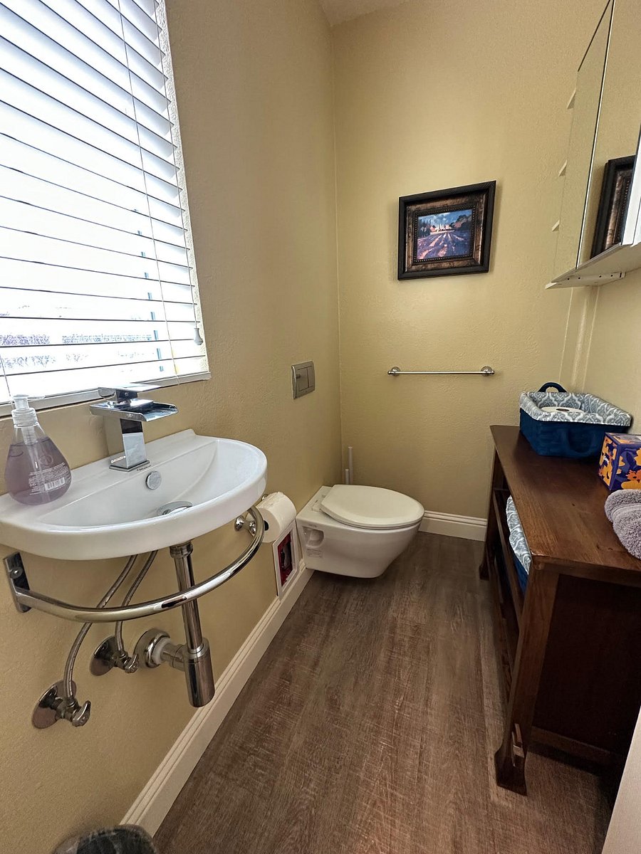 Half bath off of living area for guests