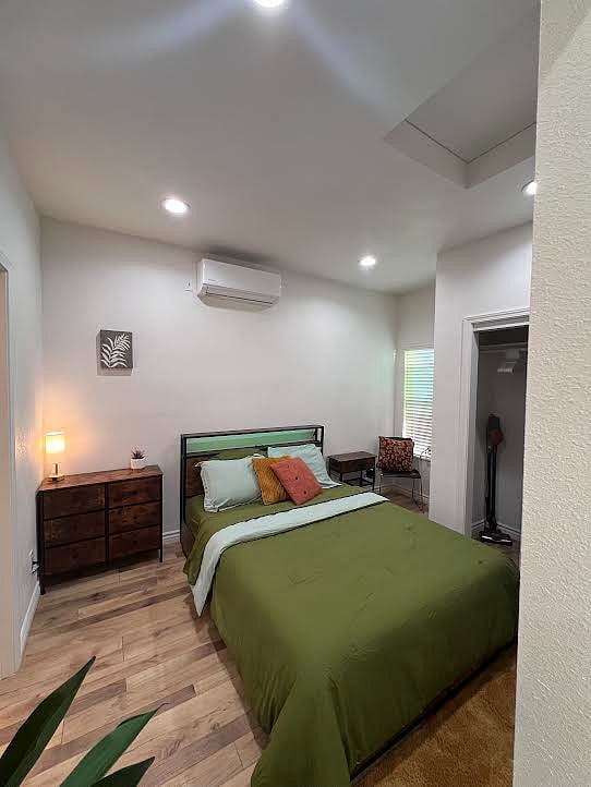 The headboard has USB and standard plug outlets. It also provides soothing ambient lighting in various colors to provide good energy, vibes and relaxation. There are also 4 drawers of under bed storage! A vaccum, iron and ironing board are provided for you.