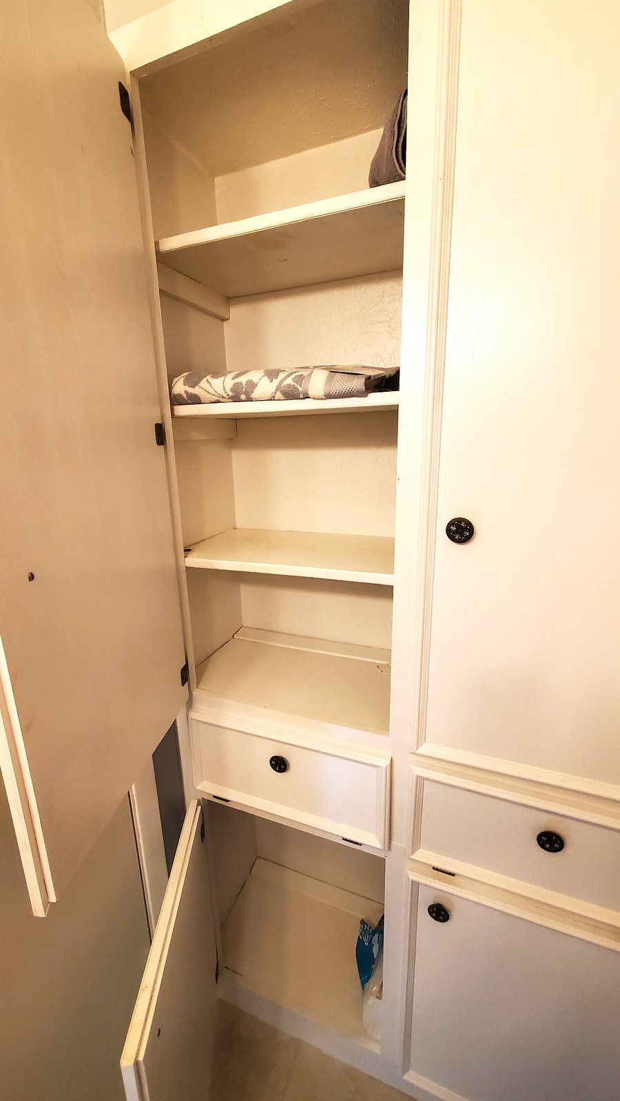 Plenty of storage in restroom