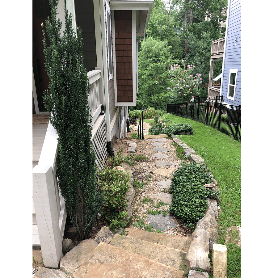 Follow this walkway to the right of the house. There is an iron railing that will guide you to your private entrance at the back of the house.
When the sun sets the pathway is automatically lit for your safety.