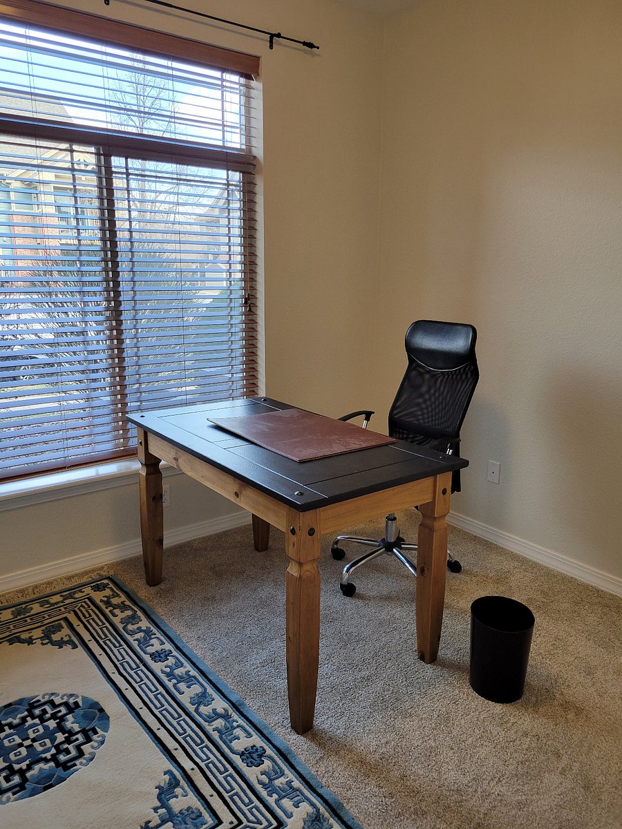 Desk in second bdrm, can easily be moved aside for yoga or exercising.