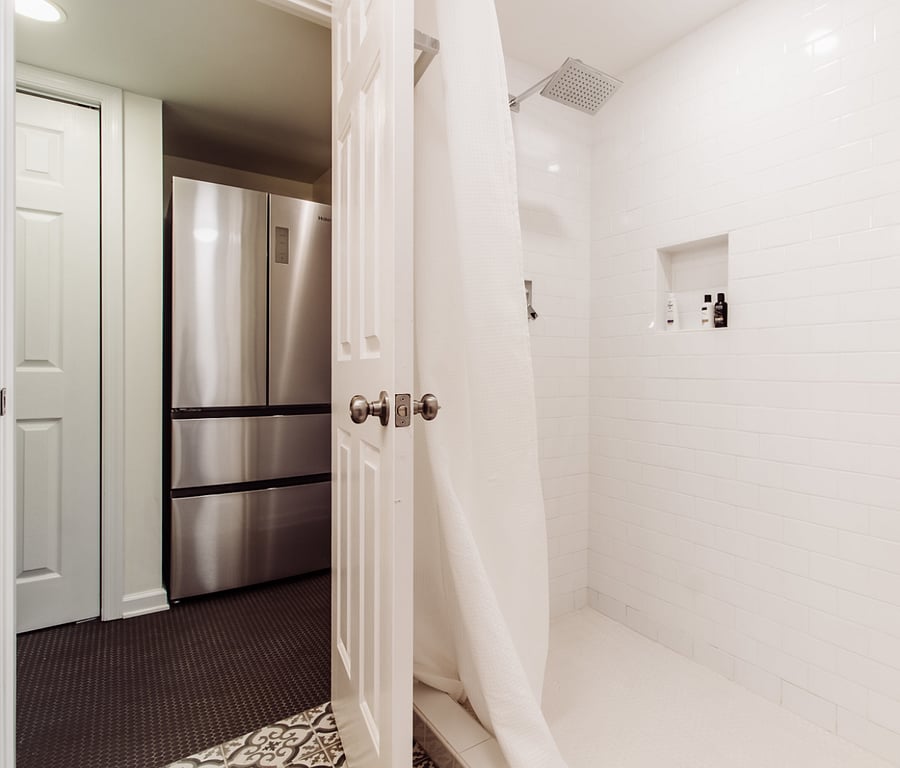 Rain shower and grab bars.