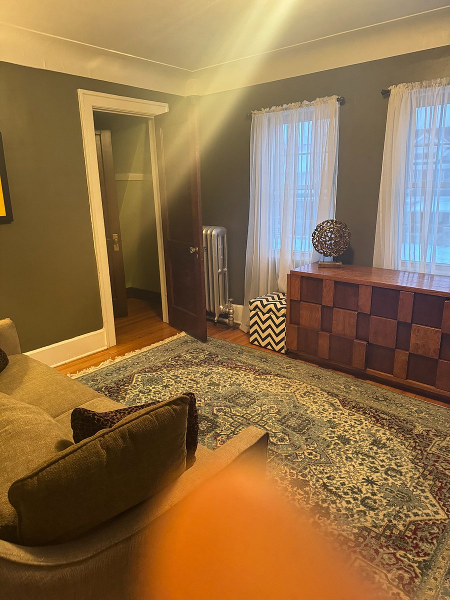 2nd Floor Sitting Room with TV and Entrance to 3rd Floor Bedroom