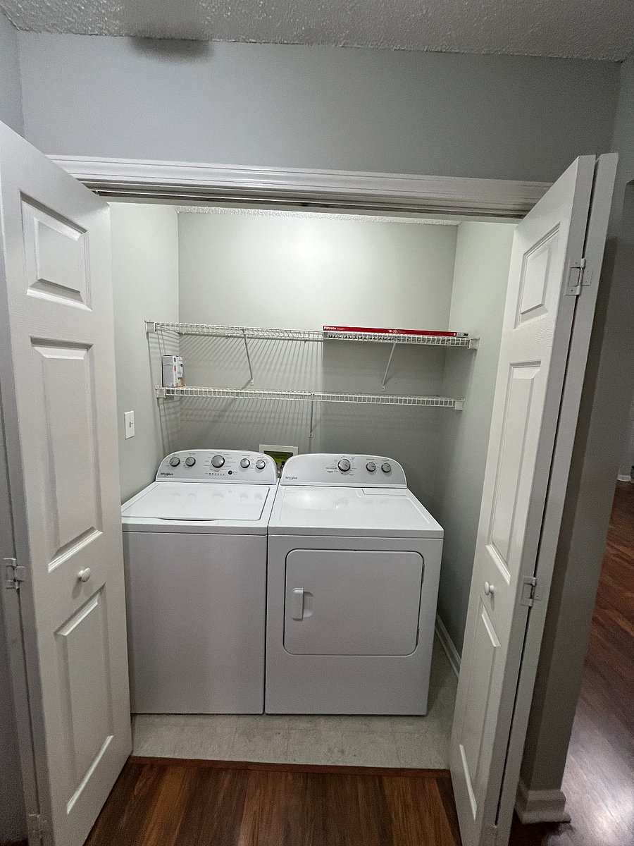 Laundry closet with washer and dryer