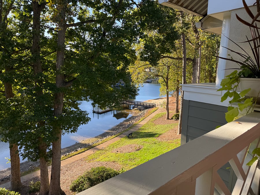 View from balcony with gazebo and small beach area.