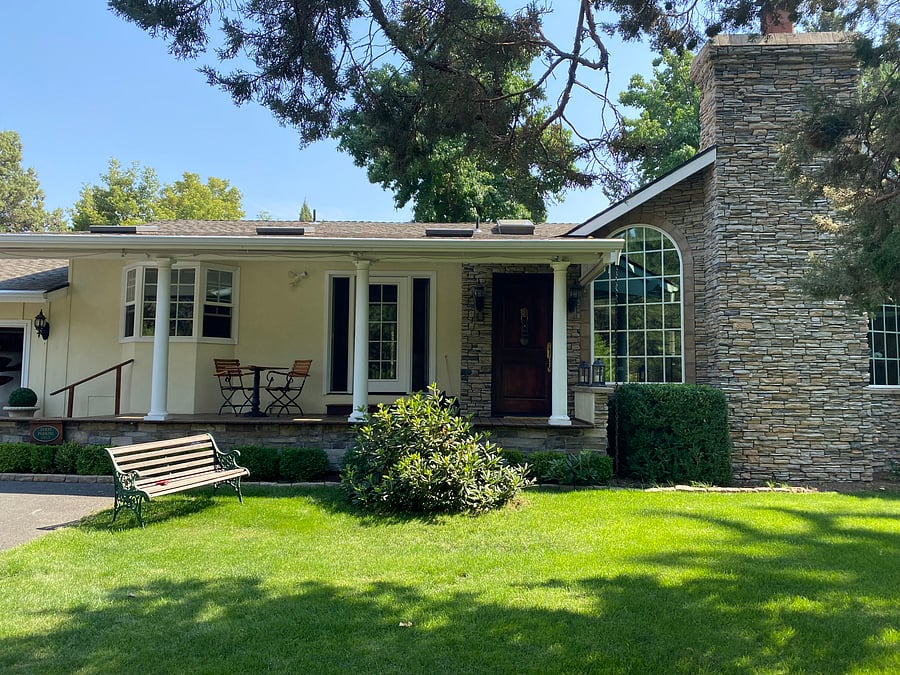 Private entry and deck overlooking the gardens