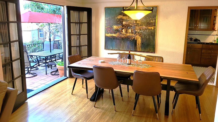 Dining room with view to outdoor patio dining table