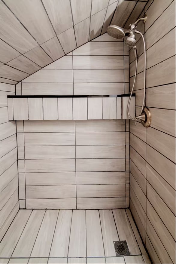 The most unique space: the floor-to-ceiling tiled bathroom!