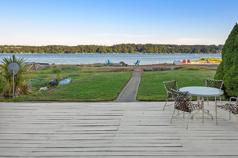 huge deck with lawn area and walk out beachfront
