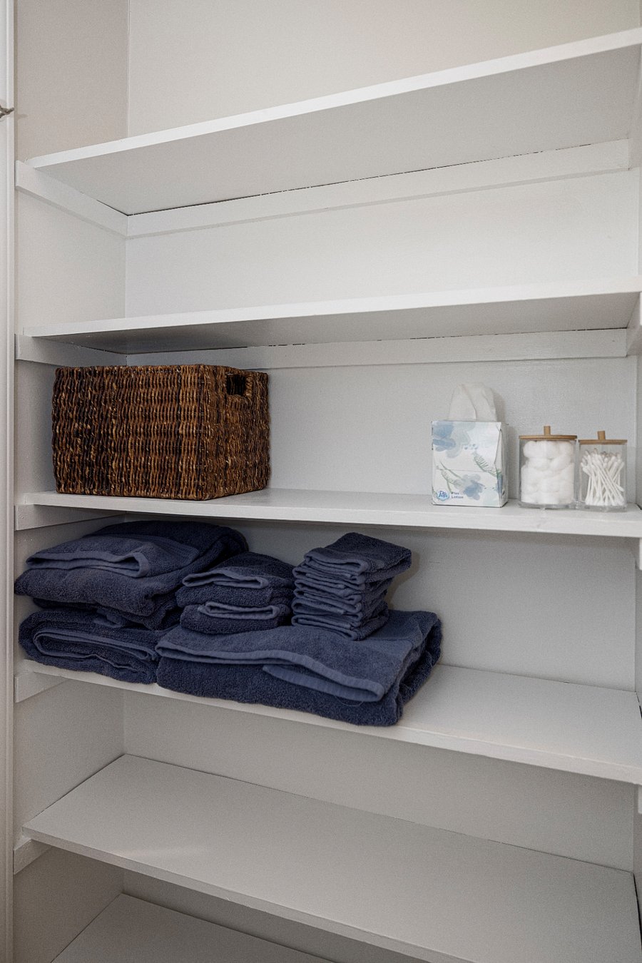There is plenty of shelving and storage in the bathroom. Starter toiletries are provided.