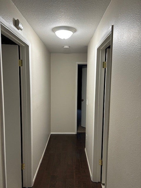 Hallway, bathroom on the right, laundry on the left, and the bedroom and the end of this hallway.