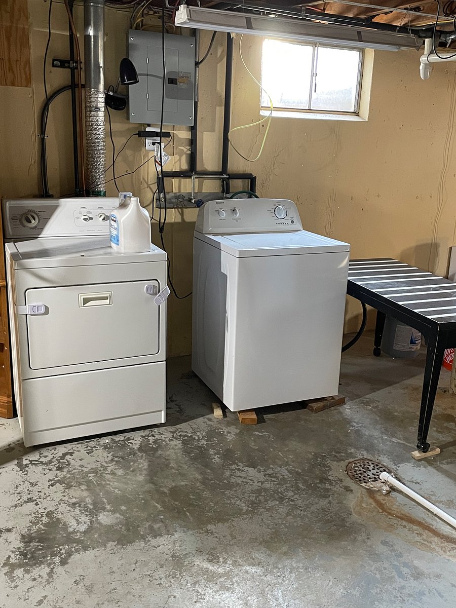 Full size washer and dryer in basement