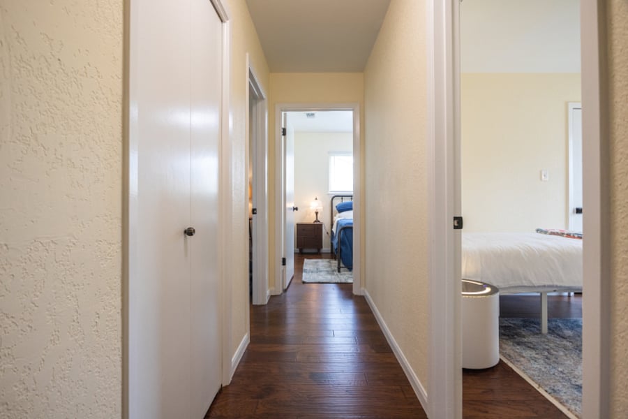 Hallway leading to all bathrooms/bedrooms