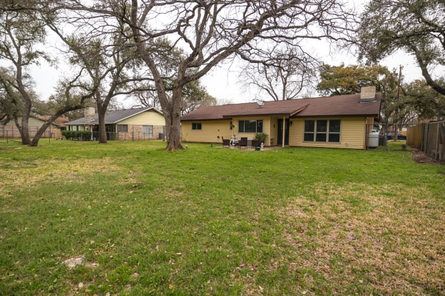 Large backyard for outdoor games or dogs to run around