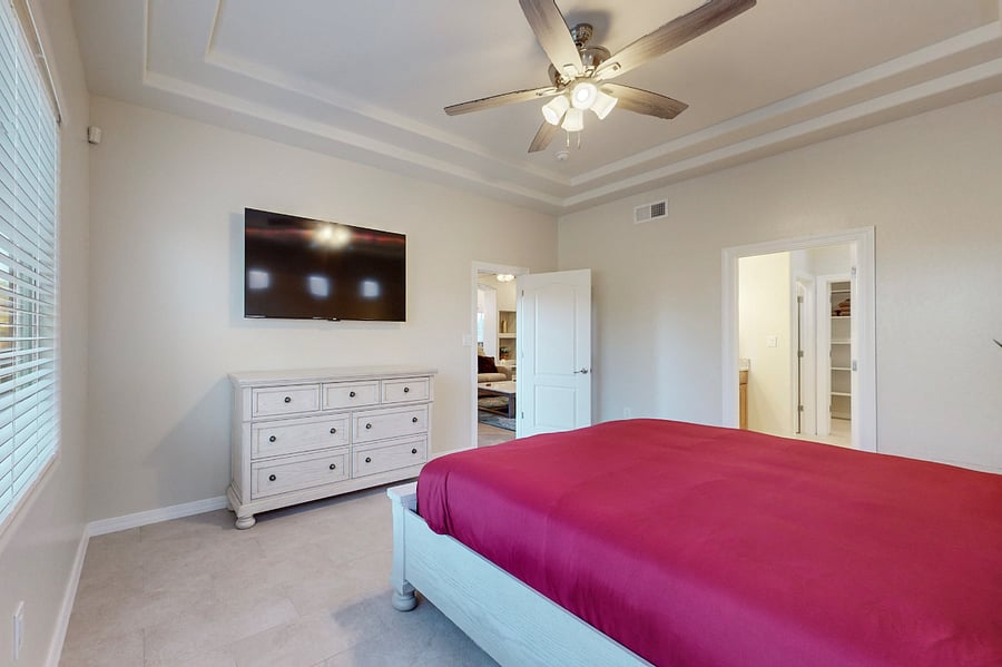 The master suite is thoughtfully designed to blend comfort with high-end aesthetics, creating a luxurious, inviting space that feels like a personal sanctuary. Indulge in binge watching your favorite shows on the 65" Smart RokuTV.
