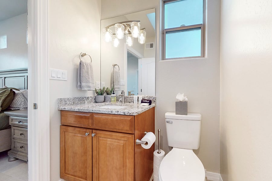The private secondary ensuite features a full bathroom with a sleek stand-up shower, providing convenience and modern comfort for your stay.