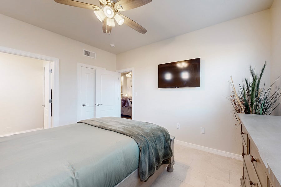 Relax in this inviting secondary ensuite, featuring a brand-new queen bedroom set, Smart RokuTV, and a private bathroom, offering comfort and privacy for a perfect stay.
