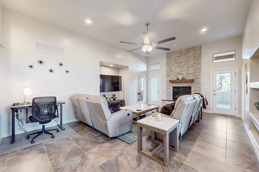 Work from home with the ergonomic workspace, equipped with a sit stand desk, comfortable chair, plenty of plug outlets, and fast wifi included.