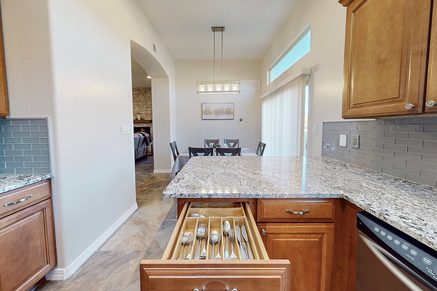 This modern kitchen is fully stocked with both small and large appliances, providing everything you need to prepare breakfast, lunch, dinner, dessert, and all the snacks you desire.