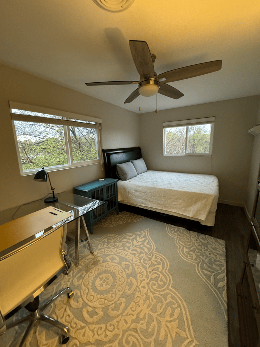 Bedroom 2 features a Queen Bed and a ton of natural light!
