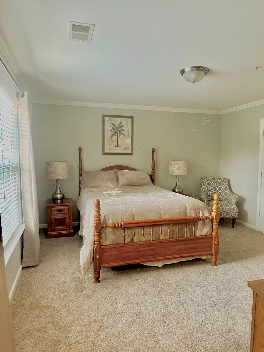 Master bedroom with queen size, pillow top mattress. Extra blankets and sheets stored in walk-in closet. Blackout curtains and Smart TV. Full bathroom in master bedroom. 