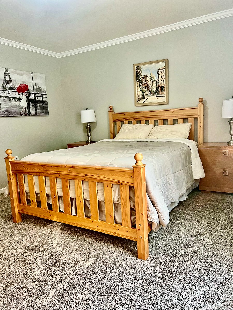 Guest bedroom features a queen size bed with smart TV, blackout curtains and a walk-in closet. Main full bathroom is located next to guest bedroom.  