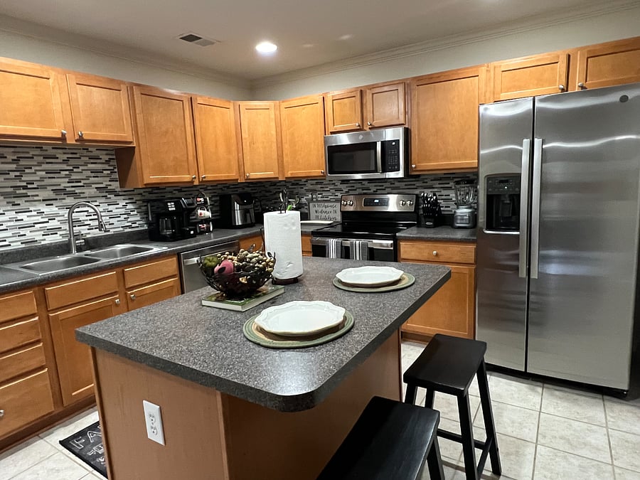 Full kitchen with new stainless-steel appliances. Kitchen has everything you need to cook or bake! Coffee pot, air fryer, blender toaster and mixer are also available! 