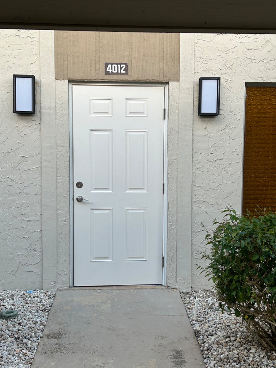 Entrance door from car port to upstairs condo