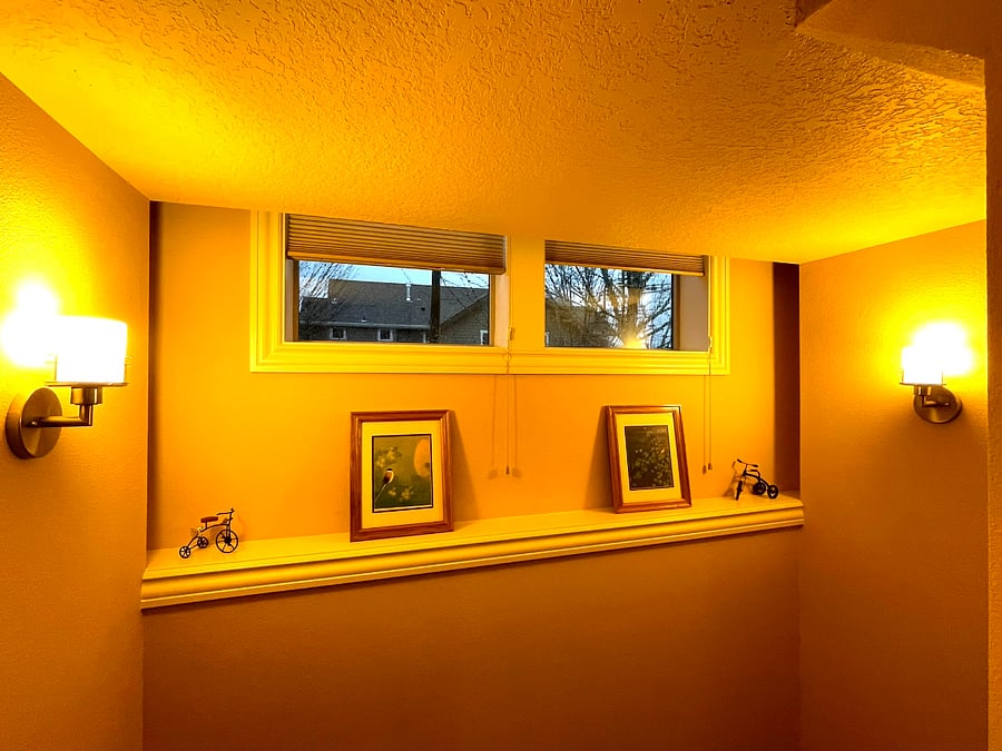 Night view from stairs to basement unit after turning from the garage entrance.
