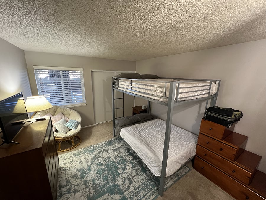 Bunk bedroom with sitting area