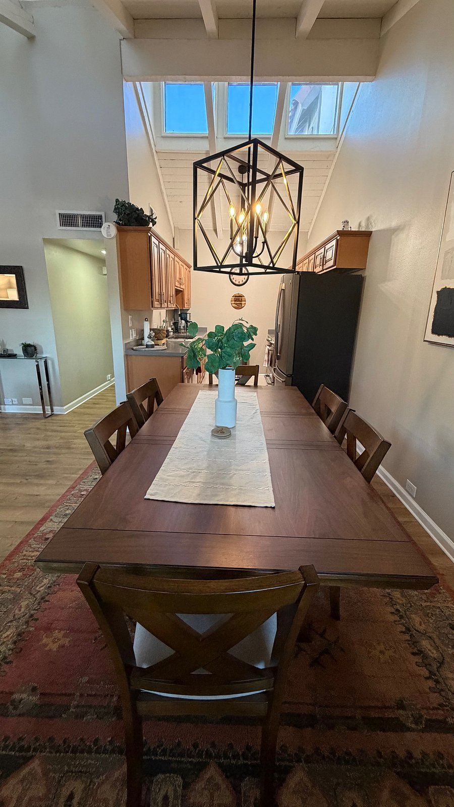 Dining table towards kitchen