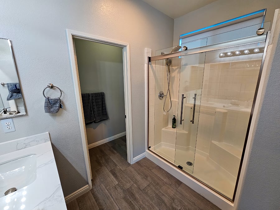Master Bathroom Shower + Door to Toilet