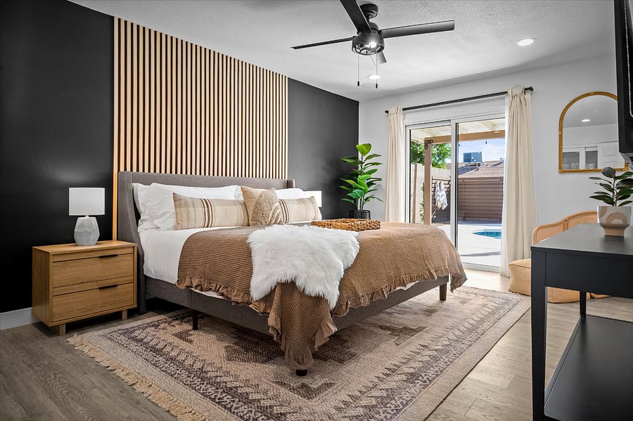 Cozy and inviting master bedroom with king size bed and luxe memory foam topper 
