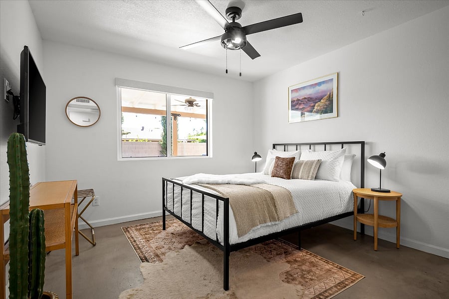 Guest bedroom with queen bed and luxe memory foam topper 