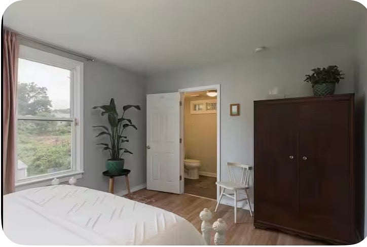 Bathroom connected to the bedroom. Bedroom overlooks backyard.