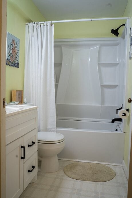 Newly remodeled third bath adjacent to third bedroom on lower level.
