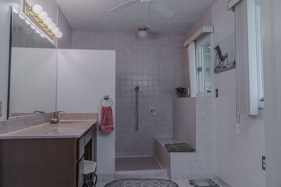 Master bathroom with regular and sit down showers. Walk-in closet adjoining.