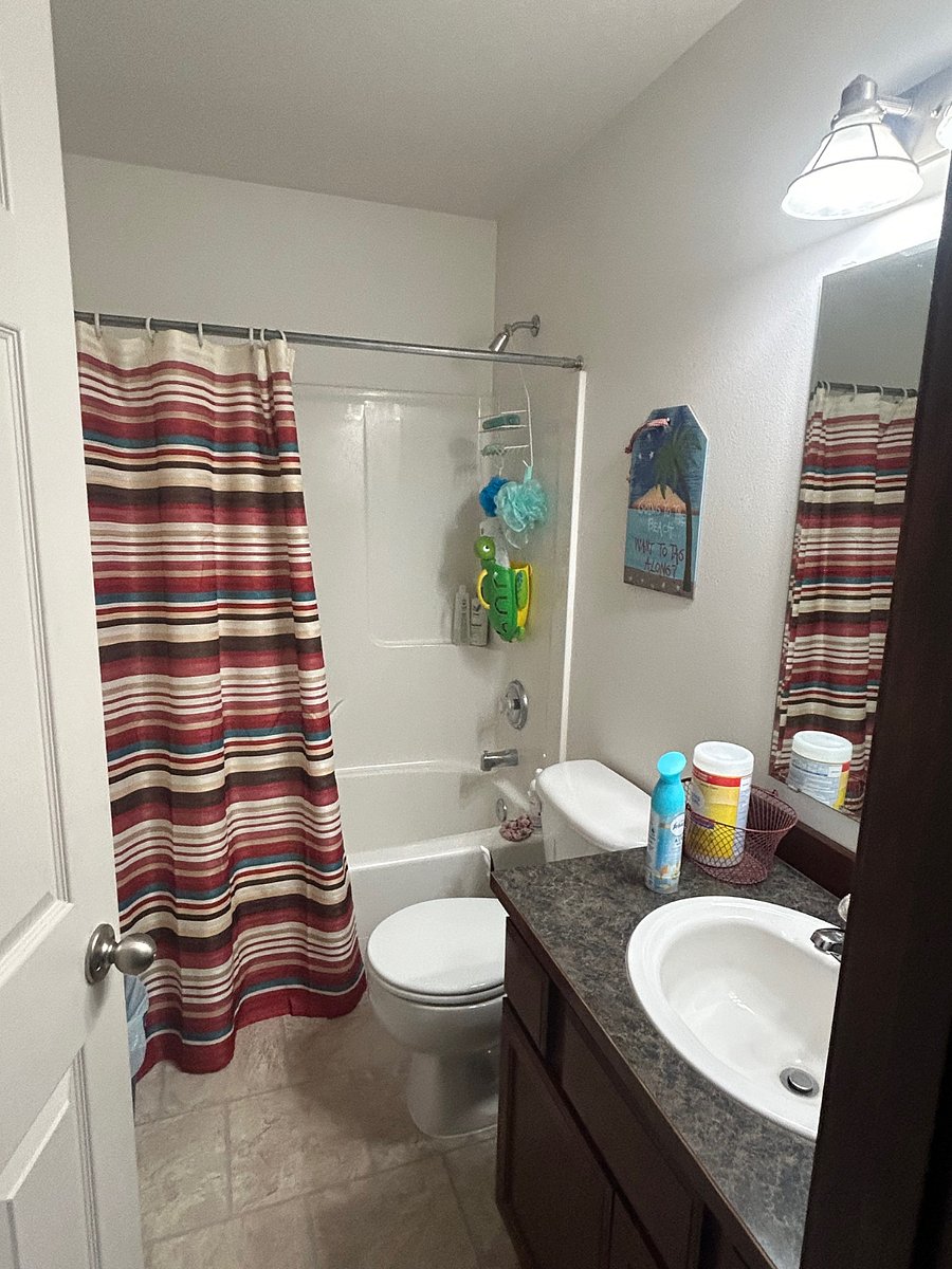 Guest bathroom. Tub shower combo.