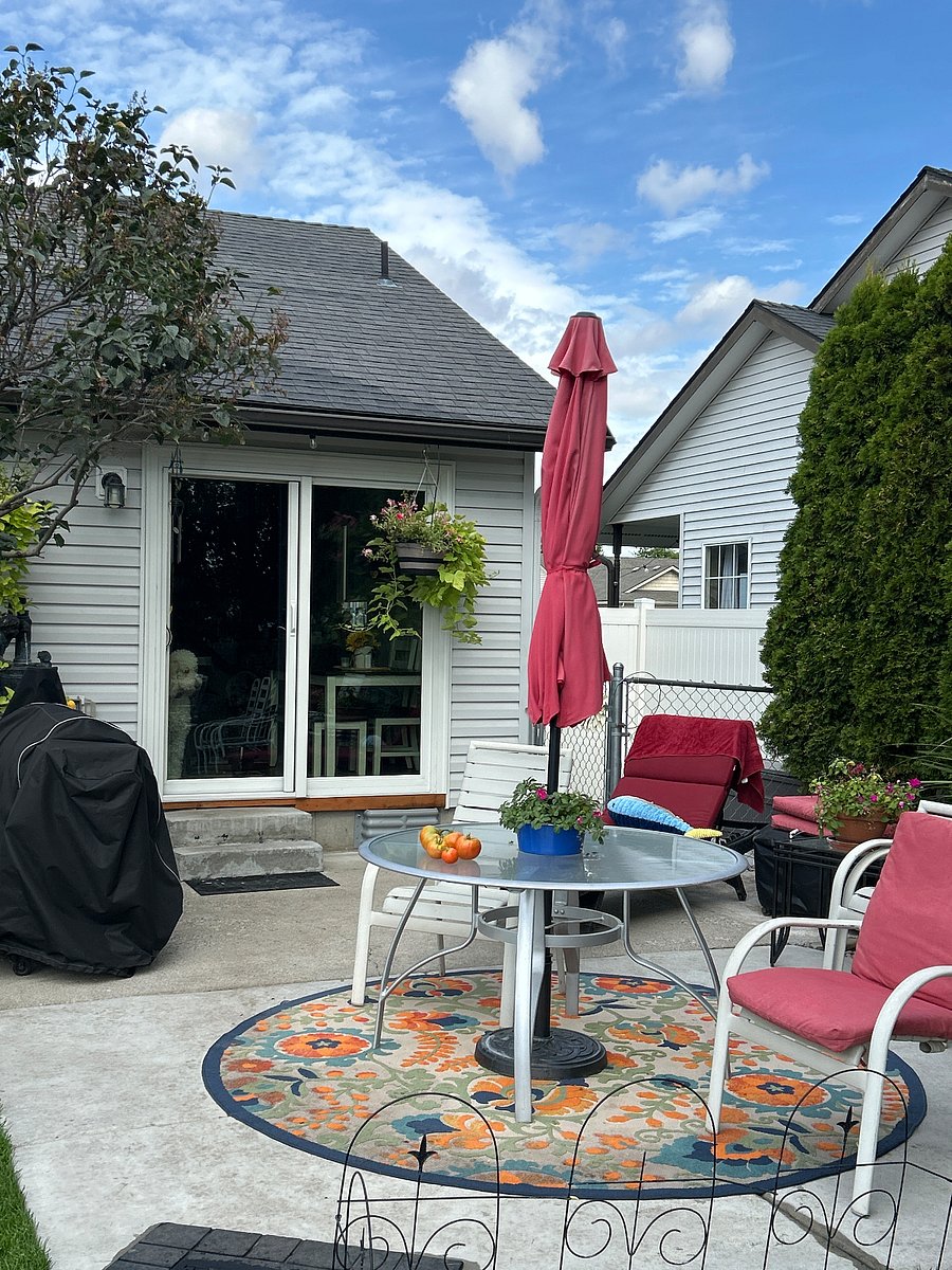 Backyard slider entrance. Pittboss Grill on back patio.