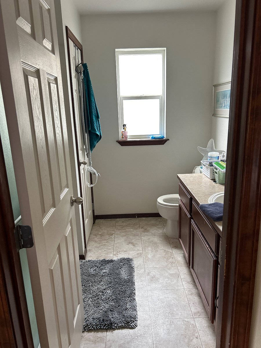 Master bath with linen closet.