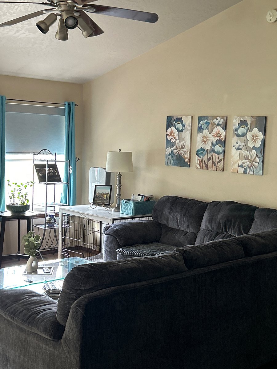 Living Room, with sectional couch and 65 inch smart TV. WiFi, Cable TV, power and water included in monthly rental fee.