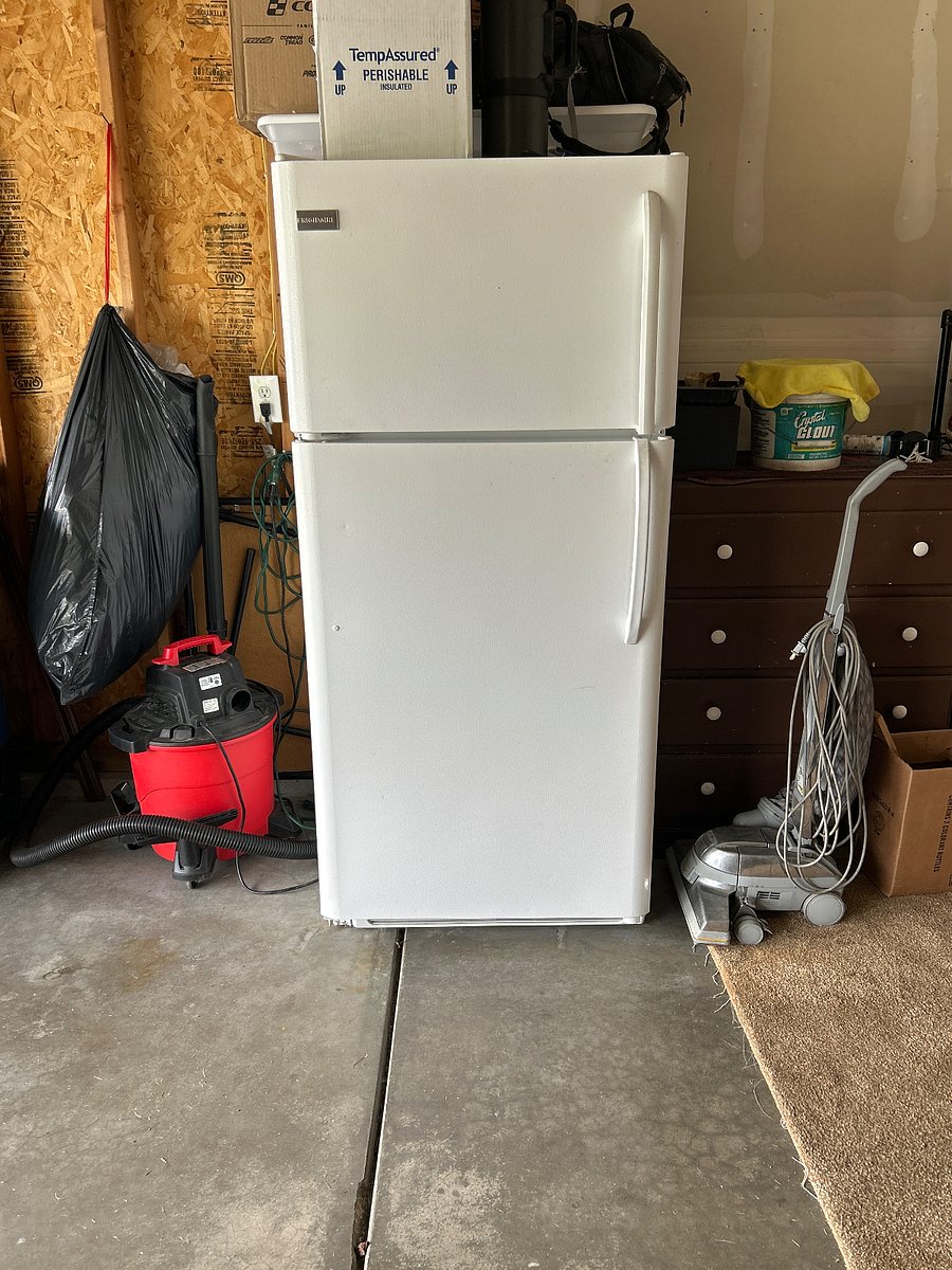 Extra fridge in garage. Shop vac and vacuum. Plenty of storage in garage and room for 1 vehicle.