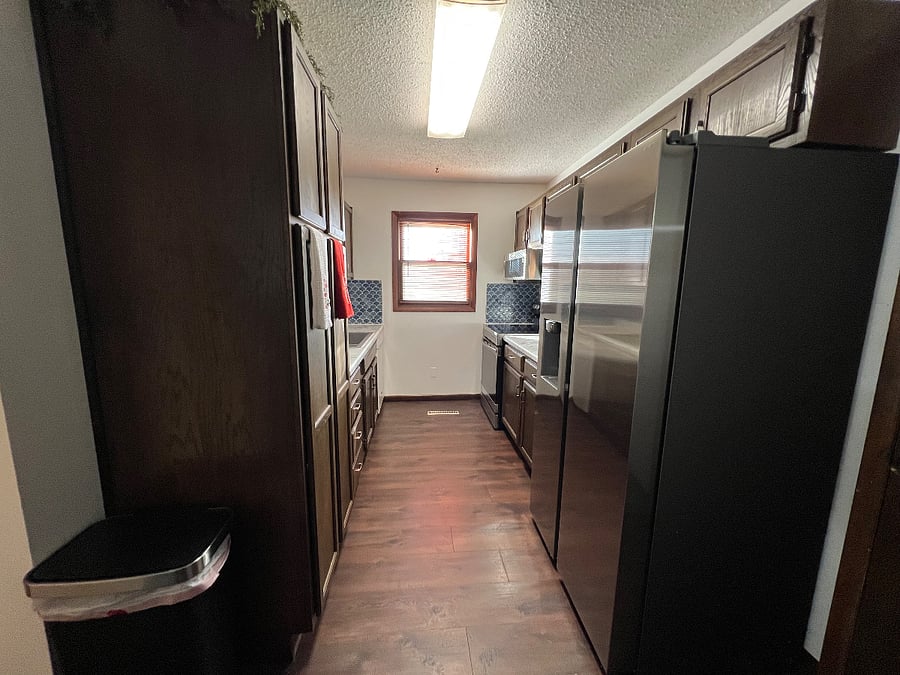 Kitchen with brand-new, full-size Fridge and Range. Small dishwasher as well!