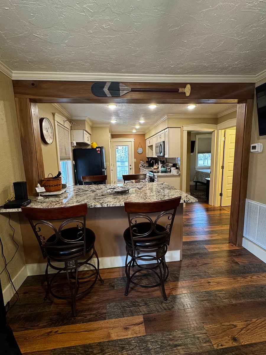 View of kitchen from front door. 