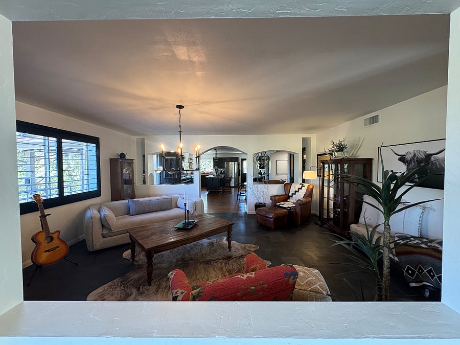 Living room with fireplace and large smart tv