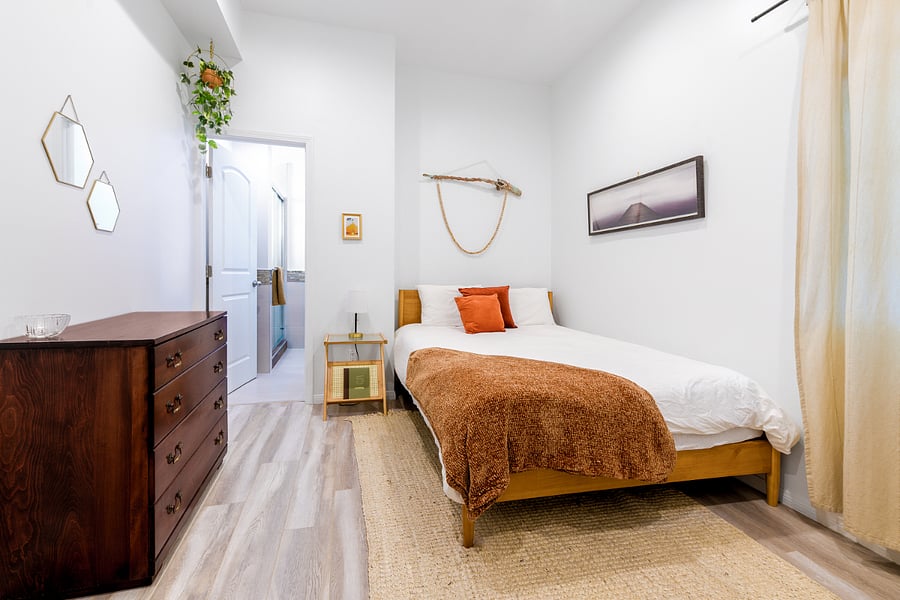 Ensuite views and an antique dresser for your finer things.