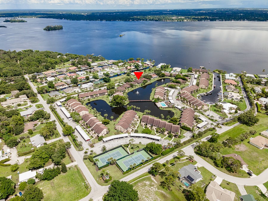 View of Admiralty Yacht Club and Caloosahatchee River. Red indicator shows House location. 