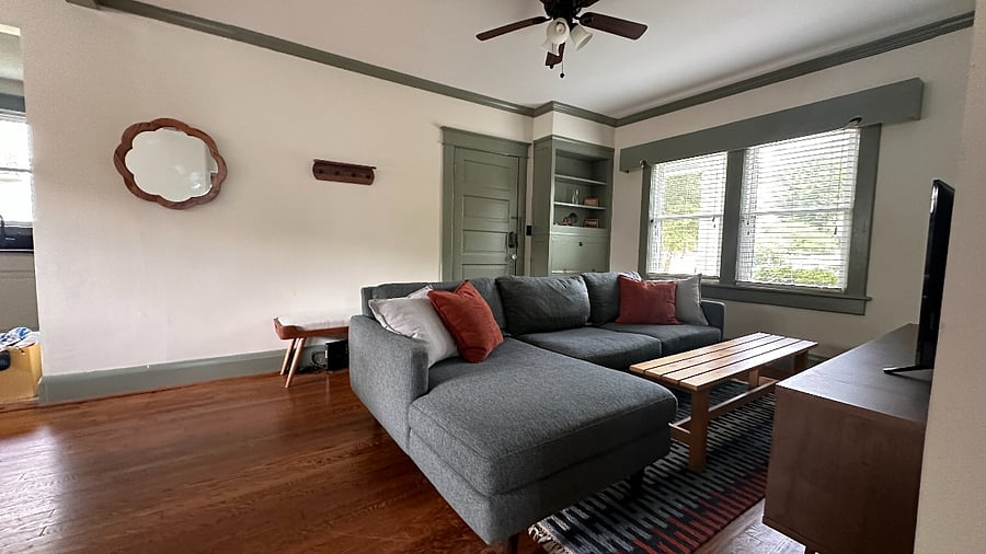Living room with sectional and Amazon FireTV (Smart TV)