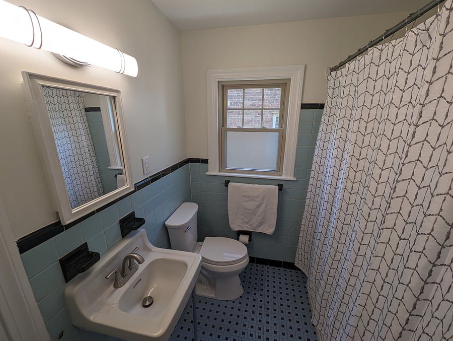 Second main floor bathroom off the hall.